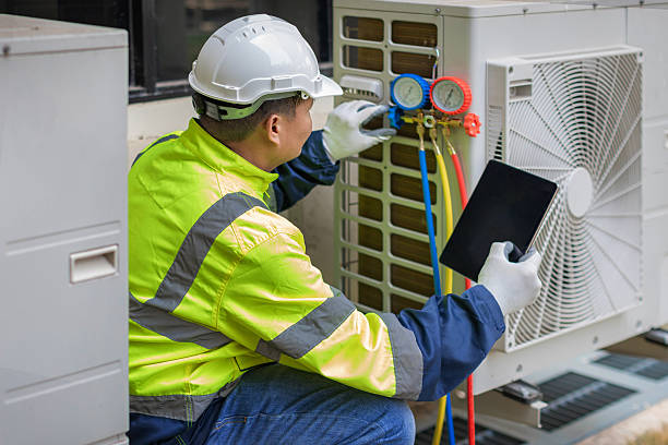 Professional Heat Pump Repair technician working in Malone, WI